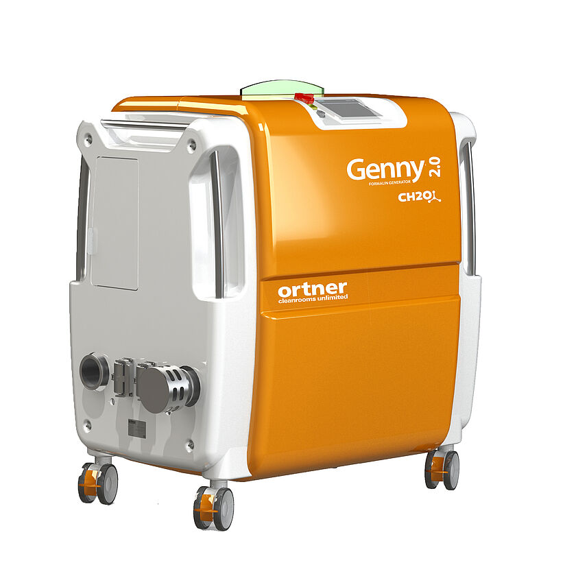A white box with rounded corners on wheels. The top, as well as the front orange. In the middle is a depression in the form of a strip. There on the left side it says 'ortner' and below that 'cleanrooms unlimited'. In the right corner of the orange part it says 'Genny 2.0' under it 'Formalin Generator' and under it 'CH2O'. On the left side of the box, two silver tubes stick out in the lower part. One of them has a lid. In the upper left corner of the white side part is a small closed door. On the top of the box there is a tablet in the center. To the left of it is a red and yellow button and a small gray button. Behind it is a small yellow glass bar that is slightly rounded on the top. On the left and right corners of the box is a long silver bar that serves as a handle. On the upper left edge is also such a handle.