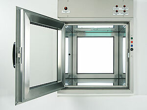 This is an internal view of the Material Transfer Hatch Active L which shows an open door