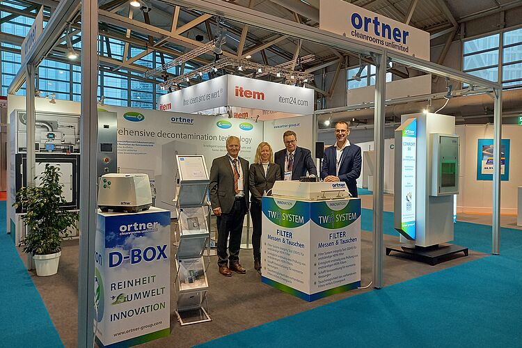 At the booth are from left to right Josef Ortner, Lisa Weiss, Michael Rötzer and Wolfram Kofler. Also there are the products: D-Box, Twin System and the MD Comfort S6.