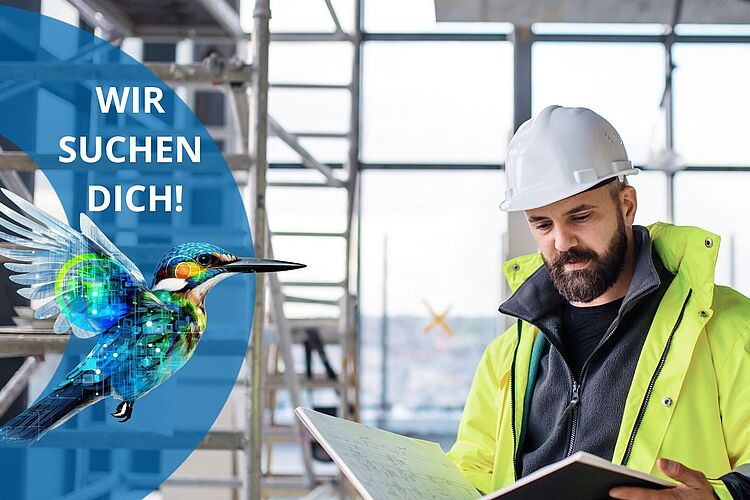 Ein Techniker liest gerade im Planungsbuch.